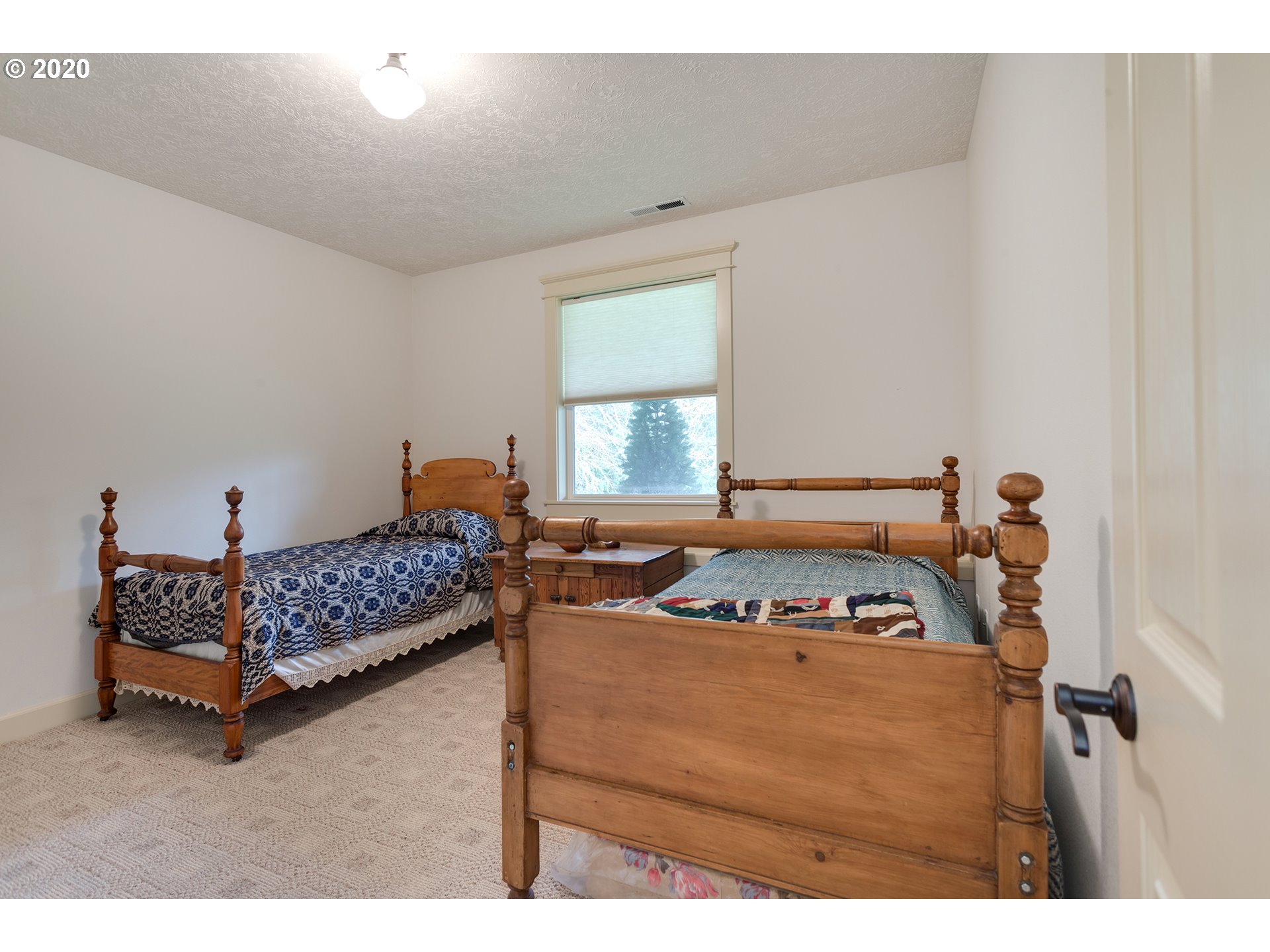 37220 Southeast Bluff Road Boring, OR 97009 - Photo 15 of 26 a bedroom with a bed and a window