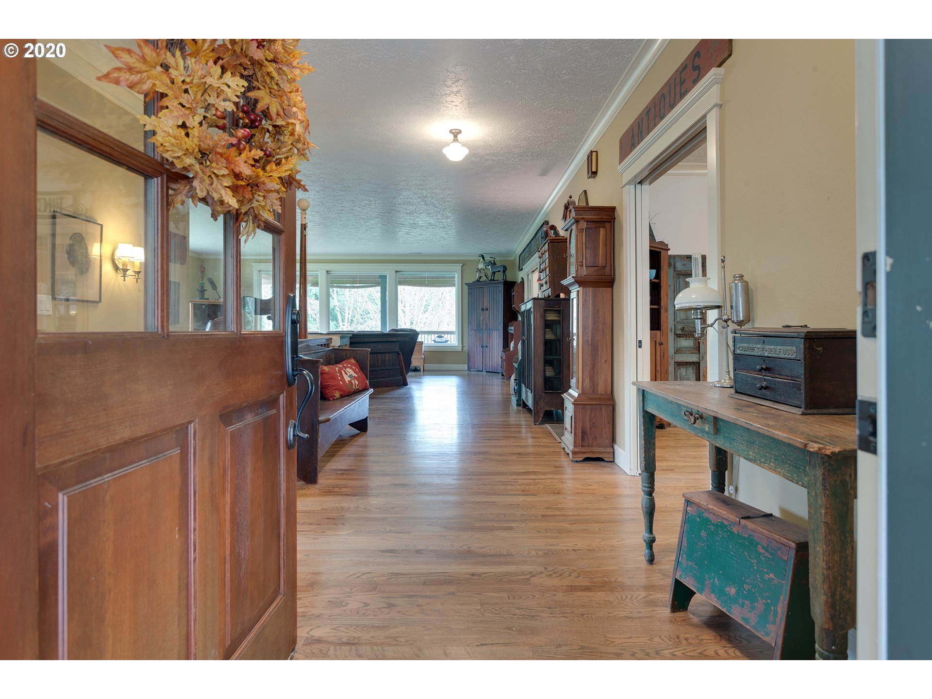 37220 Southeast Bluff Road Boring, OR 97009 - Photo 2 of 26 a living room with furniture and a wooden floor