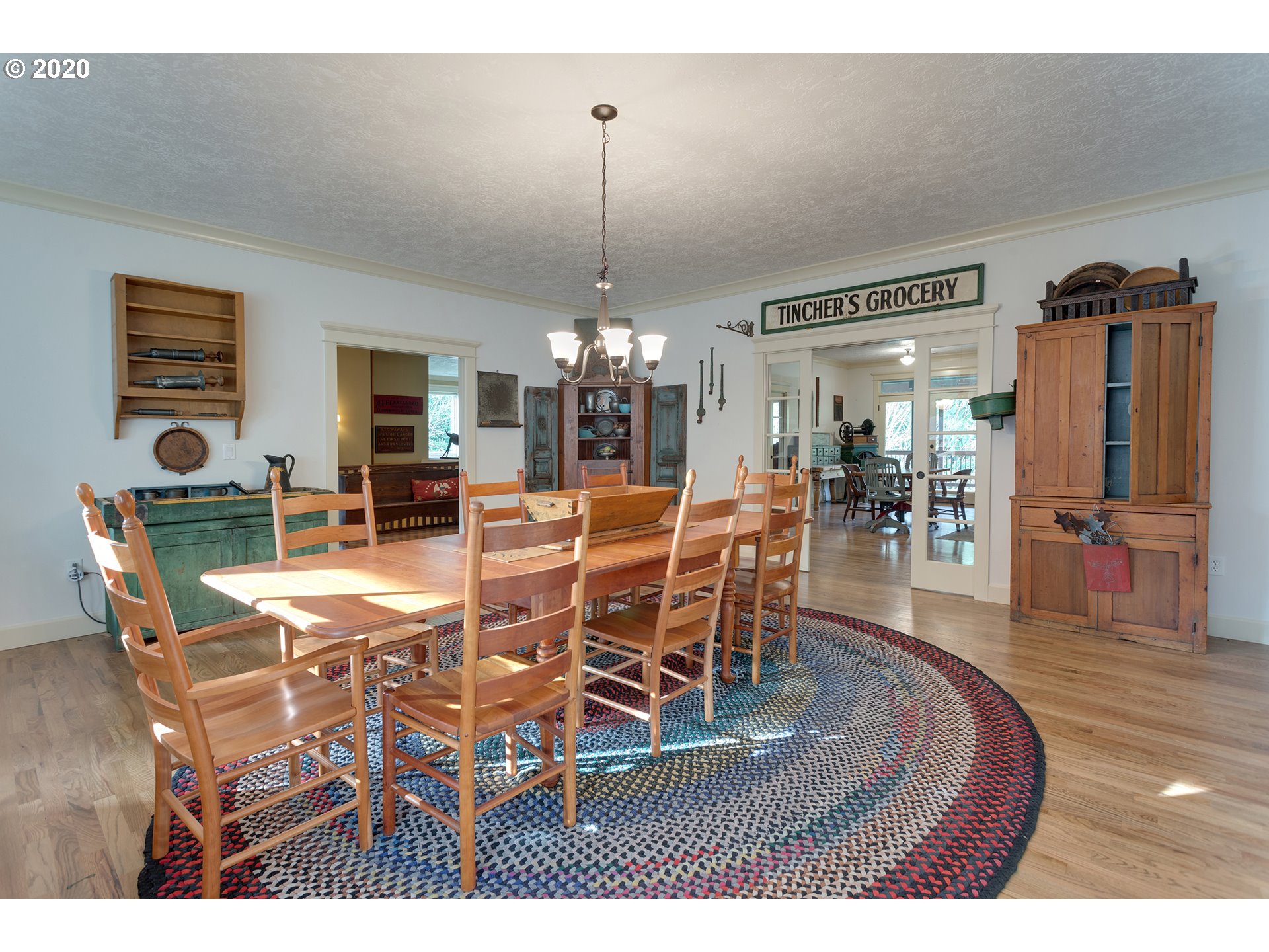 37220 Southeast Bluff Road Boring, OR 97009 - Photo 4 of 26 a dining room with furniture window and wooden floor