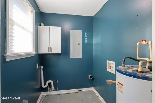 a bathroom with a sink mirror and vanity