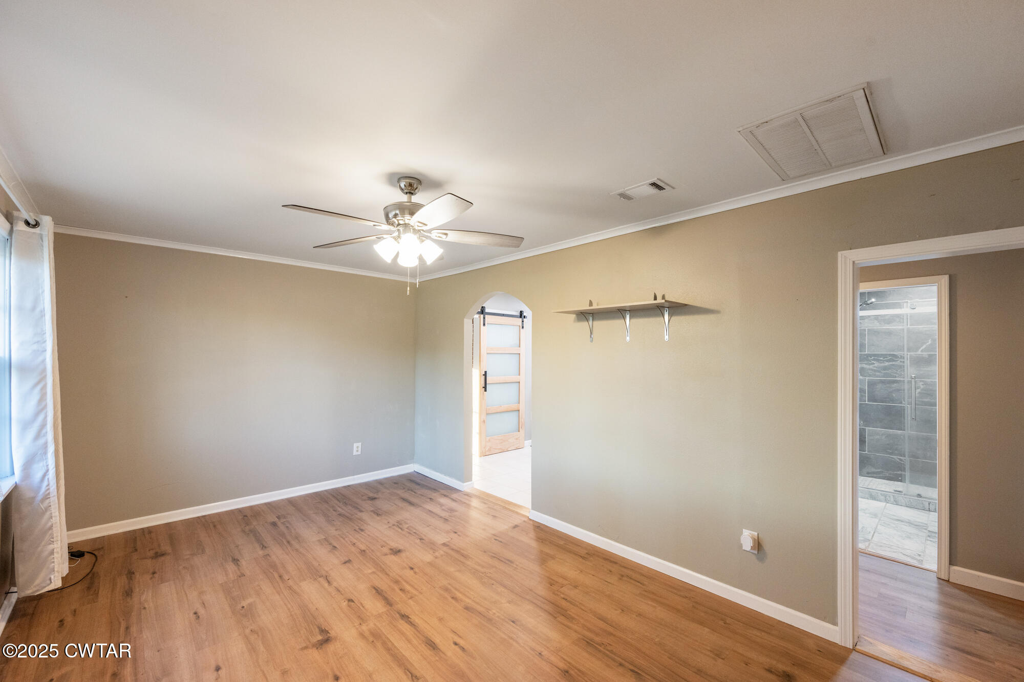 110 Highway 220 Cedar Grove, TN 38321 - Photo 5 of 12 a view of an empty room with wooden floor