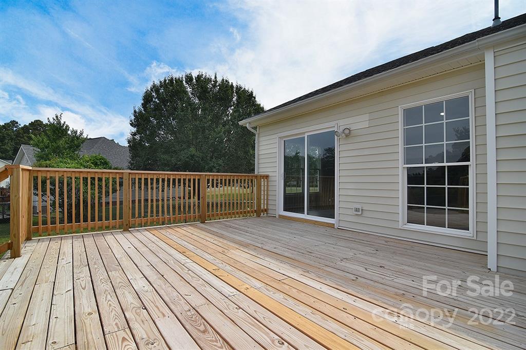 3411 Helms Pond Road, Unit 3 Monroe, NC 28110 - Photo 27 of 33 a view of a wooden deck