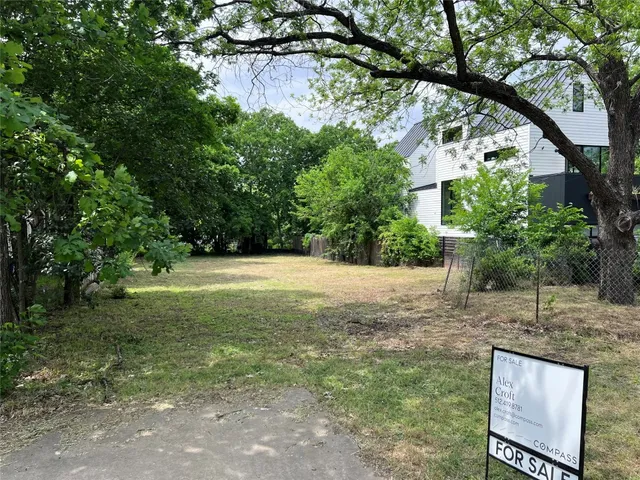 a view of backyard with green space
