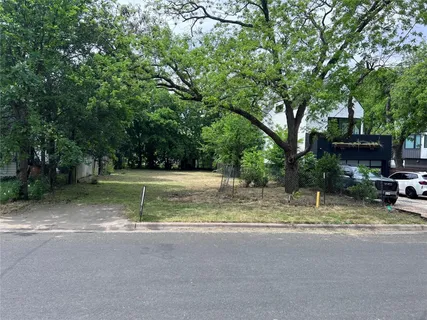 a view of backyard with green space