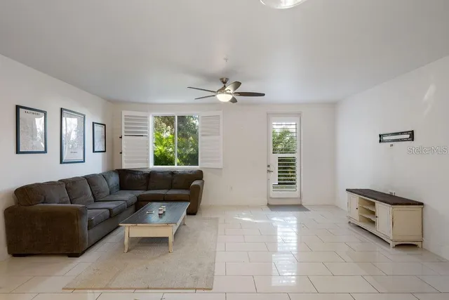 a living room with furniture and a window