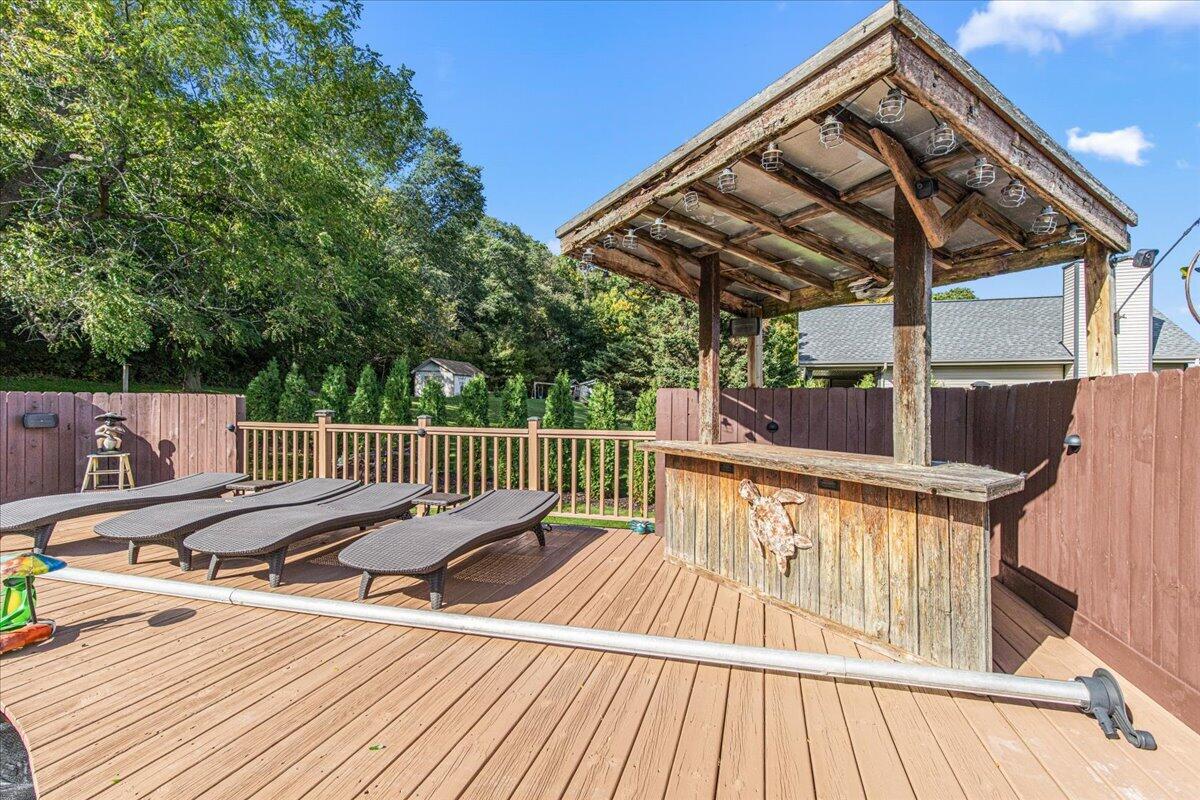 N3029 Ricardo Drive Rubicon, WI 53059 - Photo 49 of 69 DECK WITH RUSTIC DRY BAR