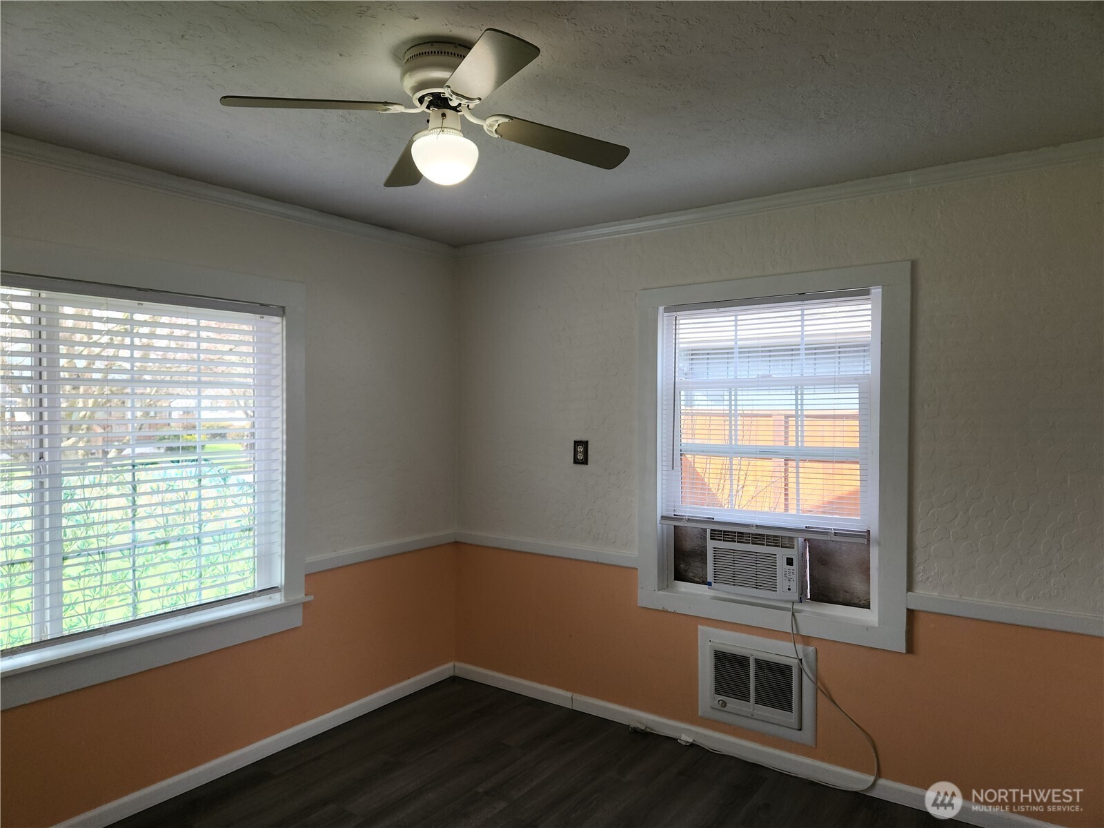 2902 Dover Street Longview, WA 98632 - Photo 19 of 23 an empty room with wooden floor and windows