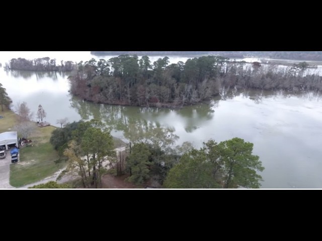 a view of lake with green space