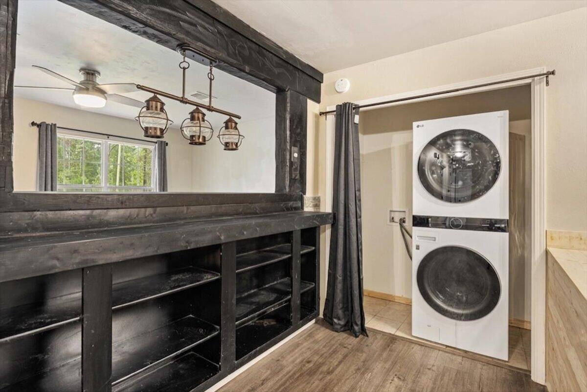 6060 Allegro Street Milton, FL 32583 - Photo 12 of 32 a view of a storage and utility room with washer and dryer