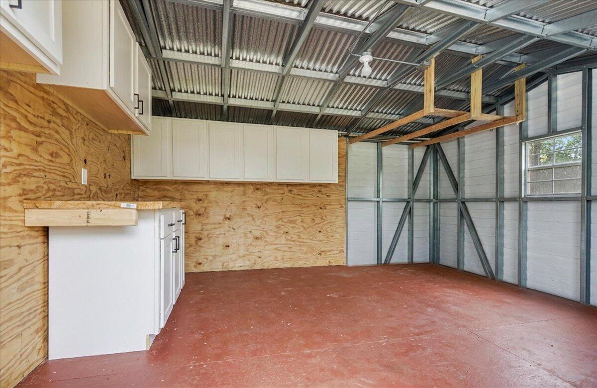 6060 Allegro Street Milton, FL 32583 - Photo 22 of 32 a view of storage and utility room