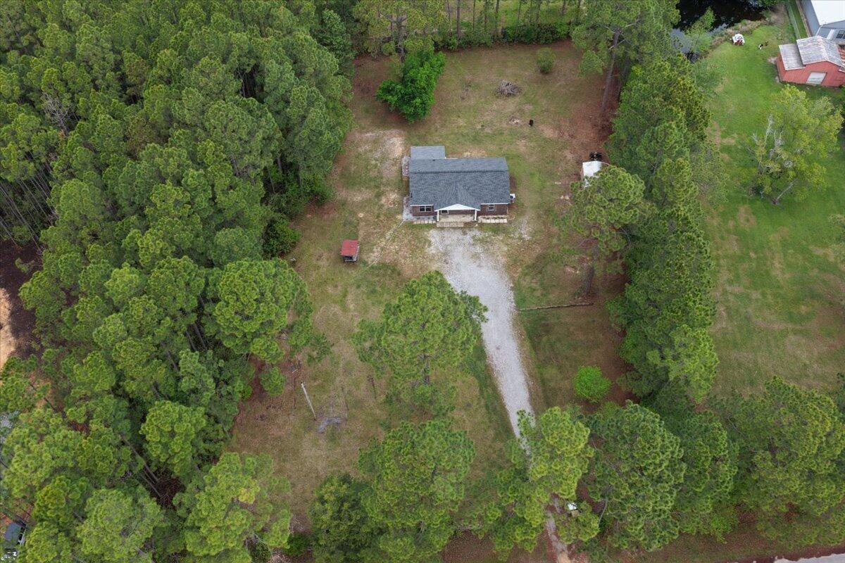 6060 Allegro Street Milton, FL 32583 - Photo 28 of 32 an aerial view of residential house with outdoor space