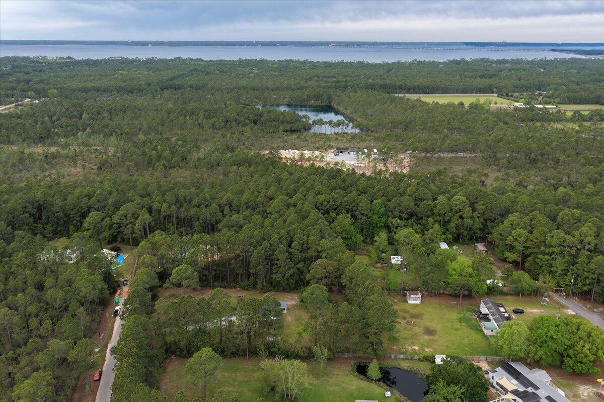 6060 Allegro Street Milton, FL 32583 - Photo 30 of 32 a view of lake with mountain