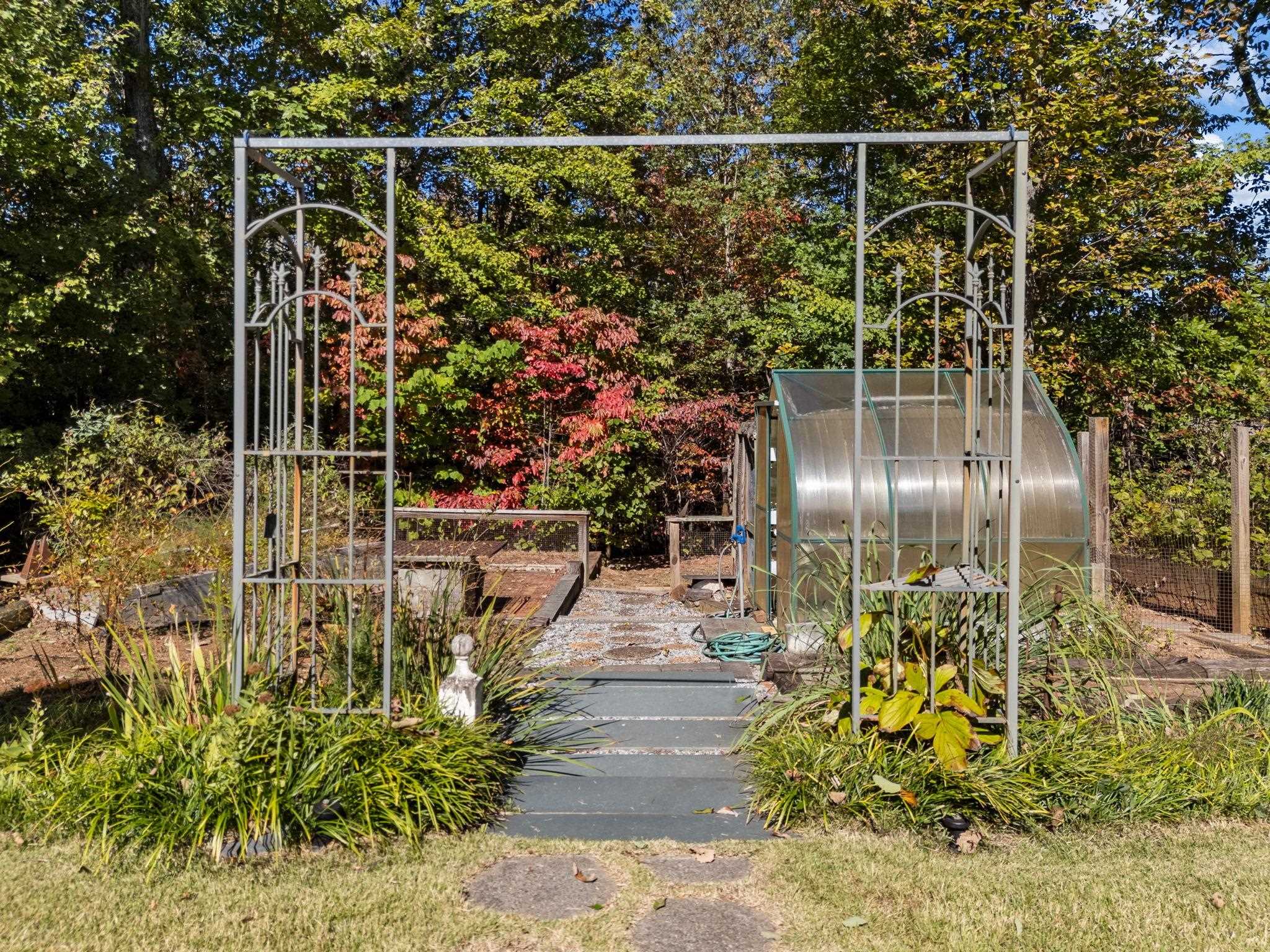 160 Caledonia Road Landrum, SC 29356 - Photo 42 of 49 Greenhouse & garden area