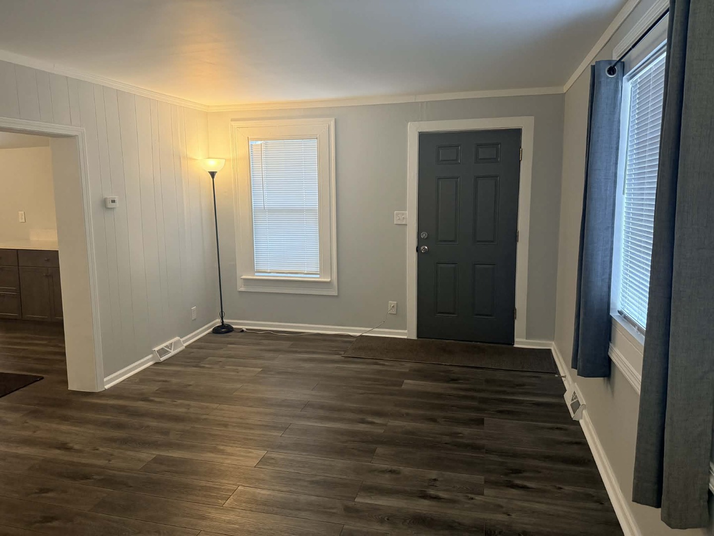 3634 Sangamon Street Steger, IL 60475 - Photo 9 of 17 a view of an empty room with wooden floor and a window