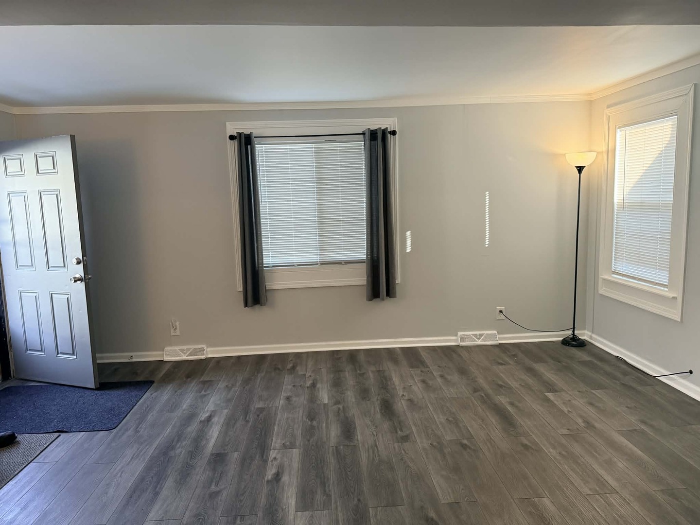 3634 Sangamon Street Steger, IL 60475 - Photo 10 of 17 an empty room with wooden floor and windows