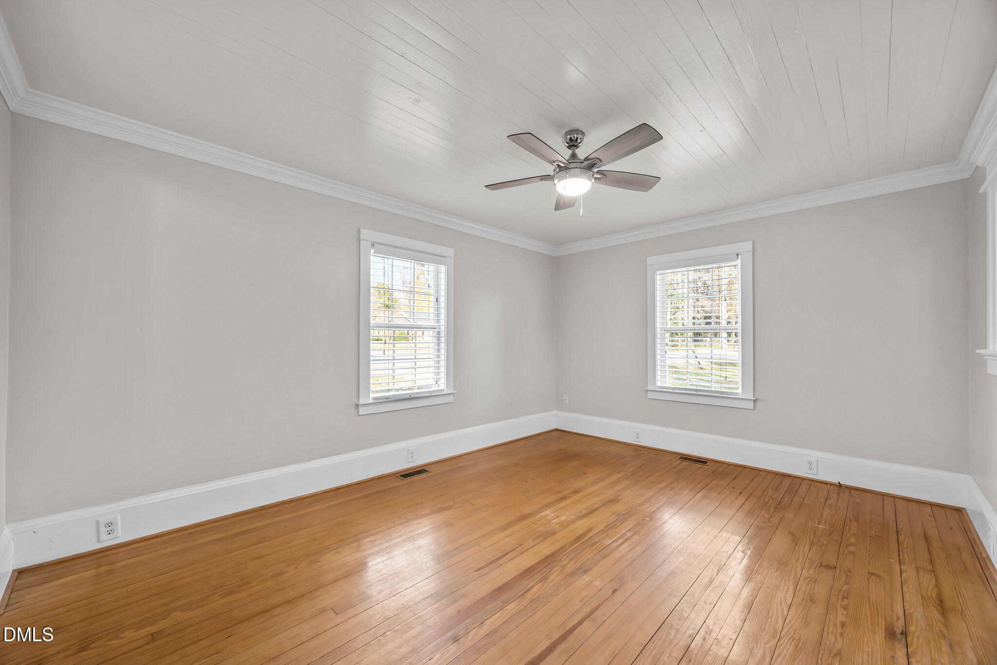 5869 Deans Street Bailey, NC 27807 - Photo 17 of 62 a view of empty room with wooden floor and fan