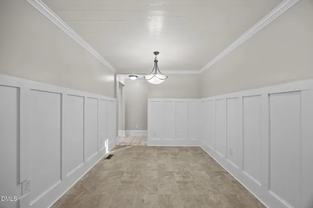 a kitchen with a refrigerator stove and microwave