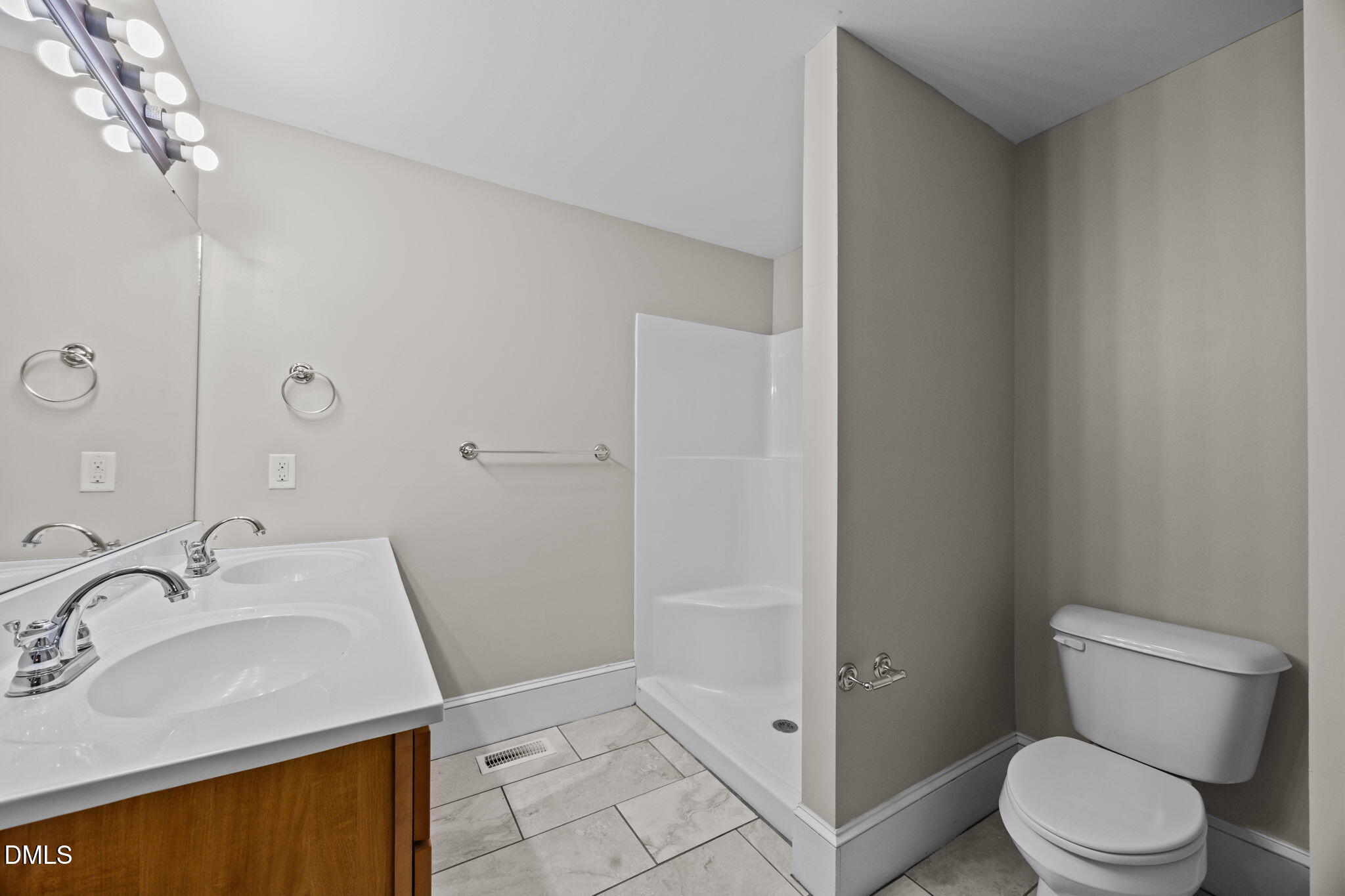 5869 Deans Street Bailey, NC 27807 - Photo 37 of 62 a bathroom with a sink toilet and shower