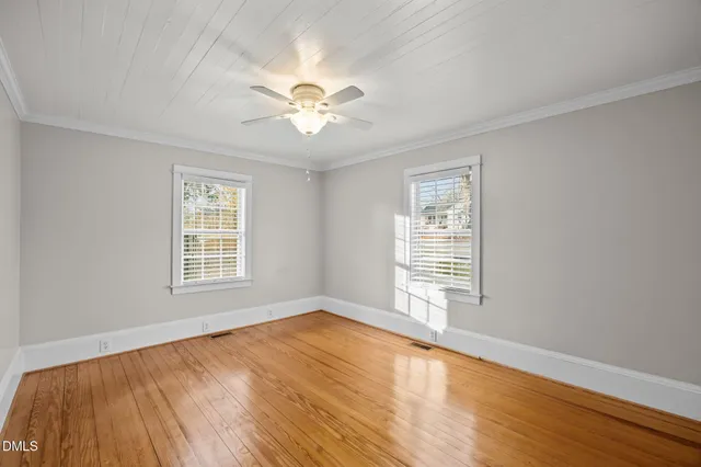 a view of backyard with a deck