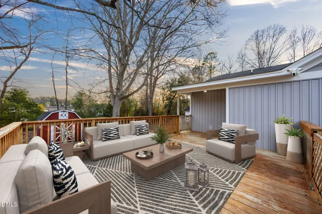a view of a park with large trees
