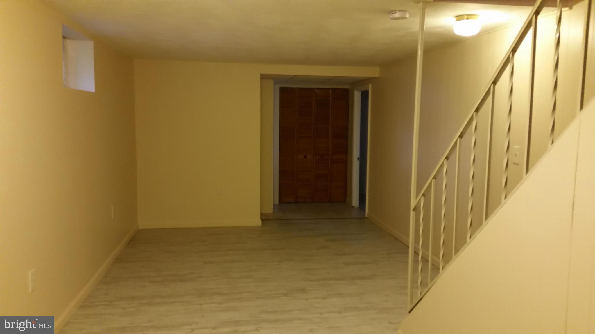 337 Bryanstone Road Reisterstown, MD 21136 - Photo 10 of 25 a view of a hallway with wooden floor