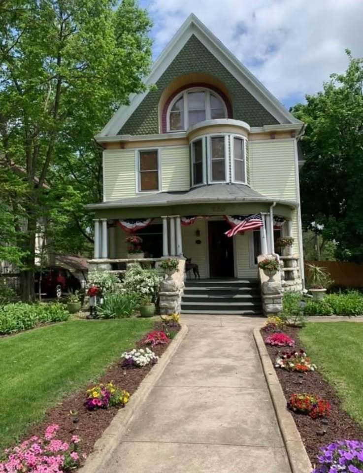 230 Comstock Street, Unit 1 Joliet, IL 60436 - Photo 1 of 20 a front view of house with yard