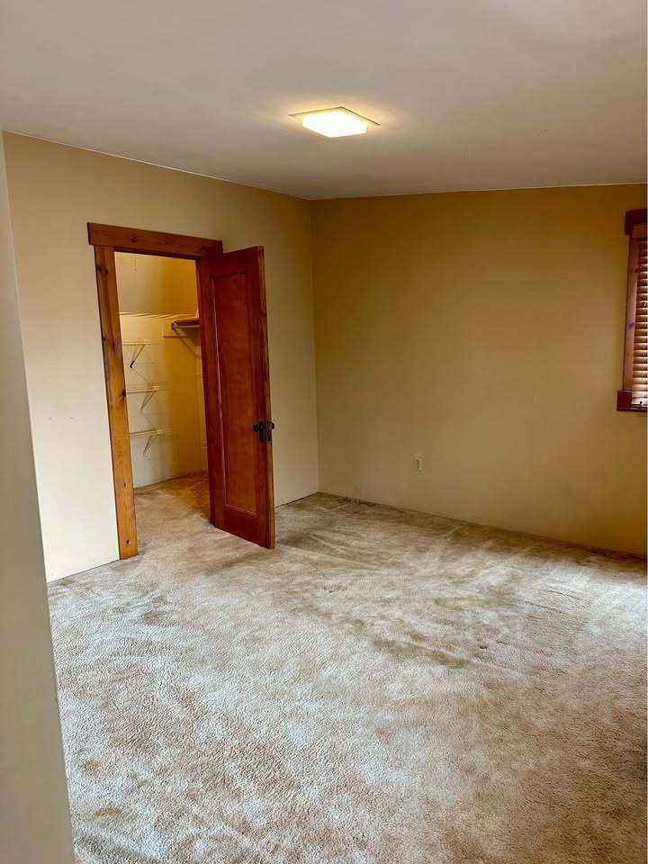 230 Comstock Street, Unit 1 Joliet, IL 60436 - Photo 11 of 20 an empty room with a natural light