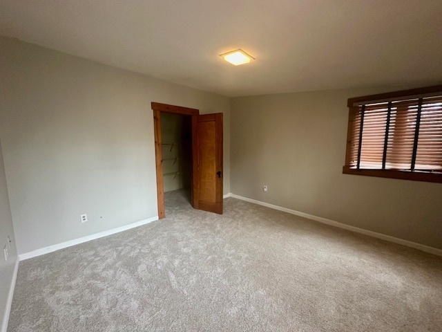 230 Comstock Street, Unit 1 Joliet, IL 60436 - Photo 15 of 20 an empty room with windows