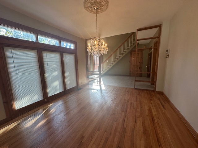 230 Comstock Street, Unit 1 Joliet, IL 60436 - Photo 6 of 20 a view of entryway with wooden floor
