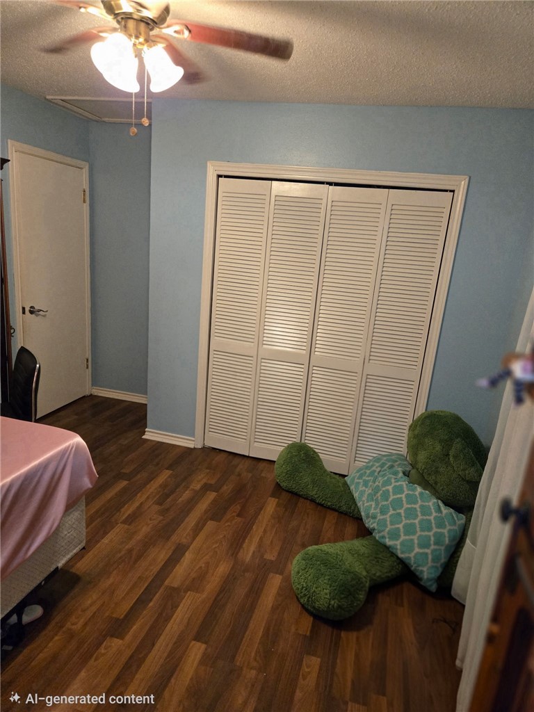 24772 County Road 360 Mathis, TX 78368 - Photo 15 of 30 a bedroom with a bed and hardwood floor