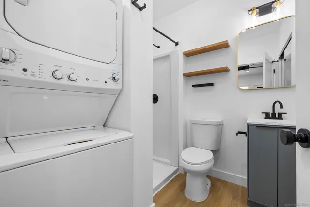 a bathroom with a toilet and a sink