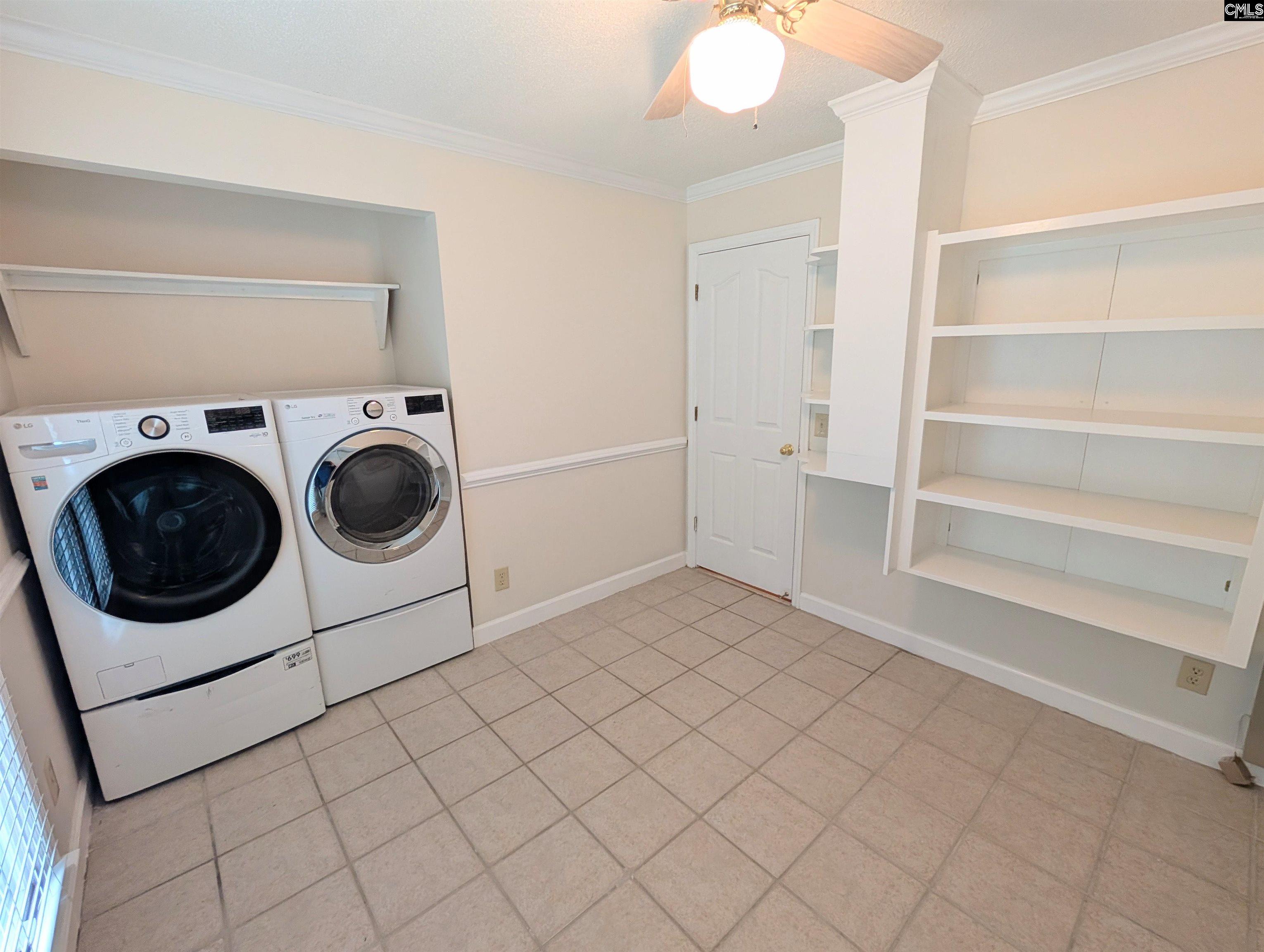 100 Welsh Court Lexington, SC 29073 - Photo 16 of 27 a utility room with dryer and washer