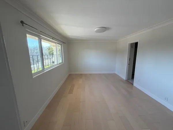 an empty room with windows