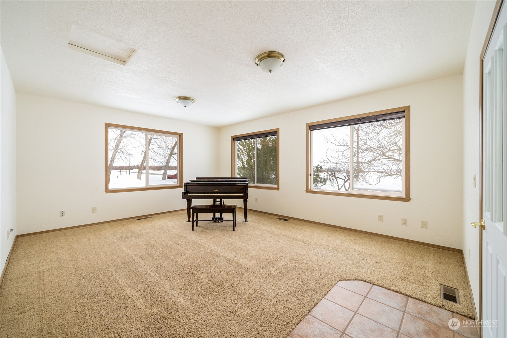 141 Johnson Creek Road Omak, WA 98841 - Photo 16 of 40 a view of an empty room with a window