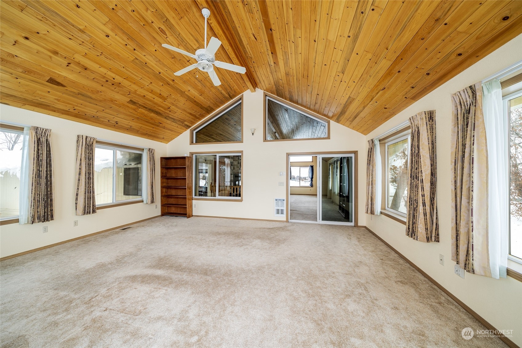141 Johnson Creek Road Omak, WA 98841 - Photo 26 of 40 a view of a house with large windows