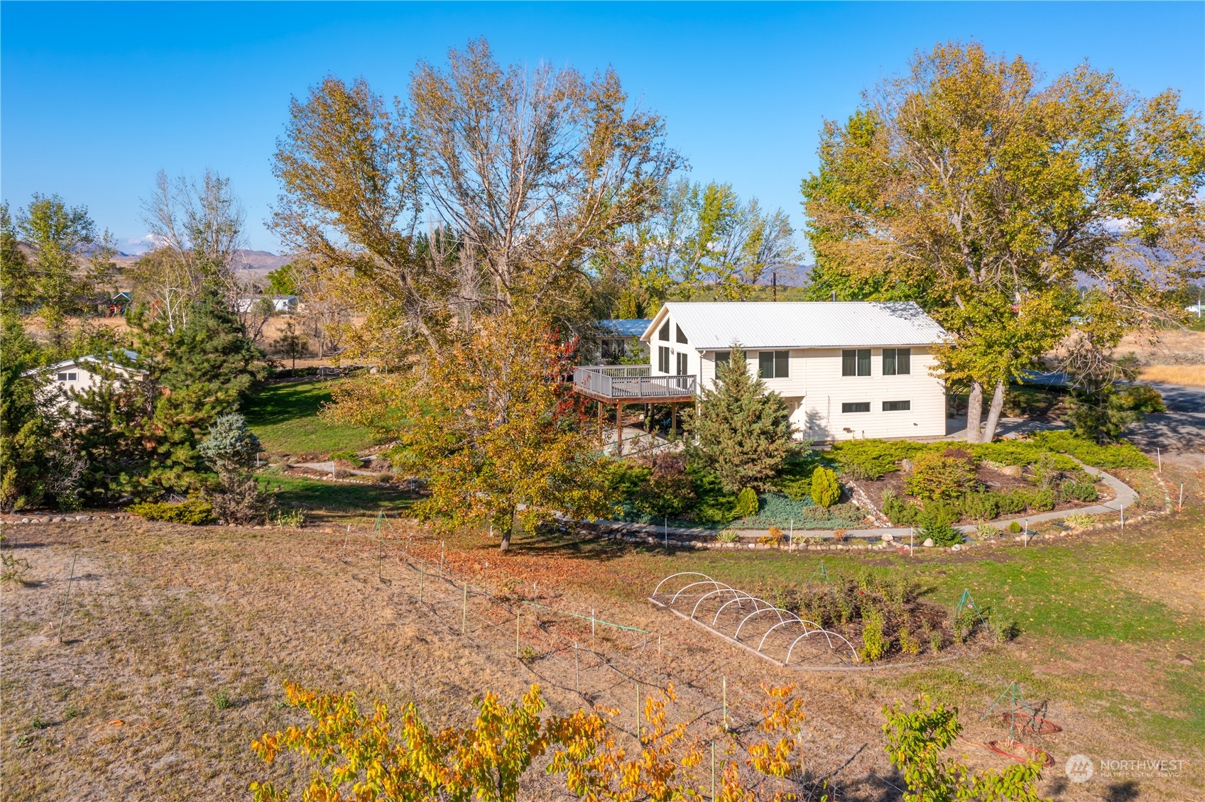 141 Johnson Creek Road Omak, WA 98841 - Photo 39 of 40 a front view of a house with a yard