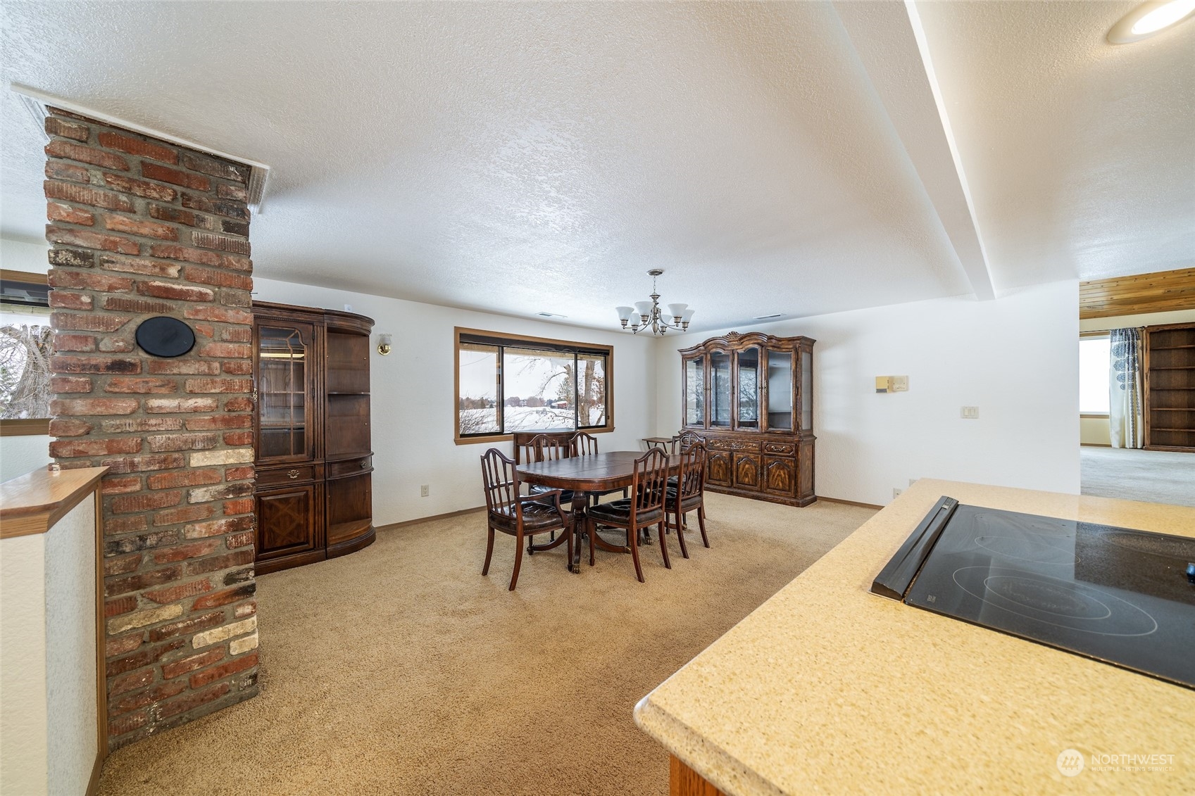 141 Johnson Creek Road Omak, WA 98841 - Photo 9 of 40 a living room with furniture and a fireplace