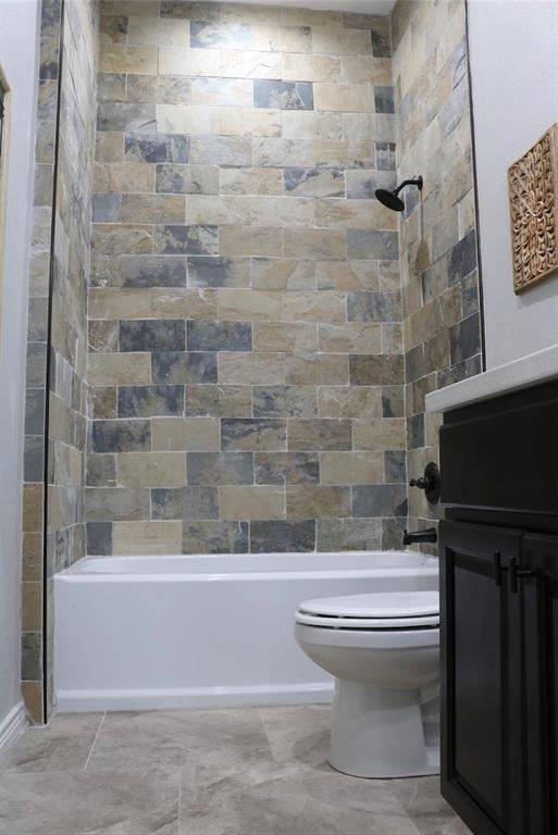 119 Dove Street Boyd, TX 76023 - Photo 16 of 18 a bathroom with a toilet and a shower