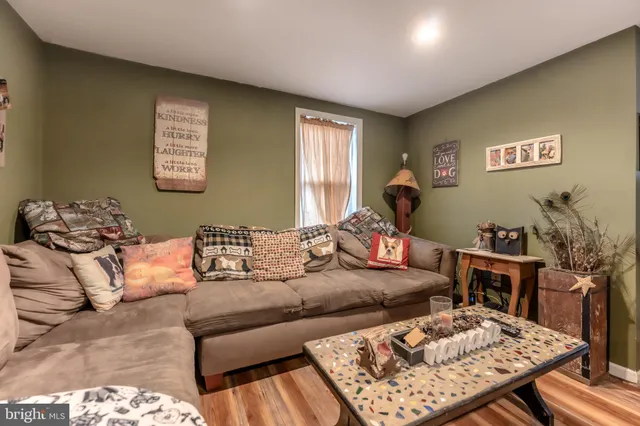 a living room with furniture and a couch