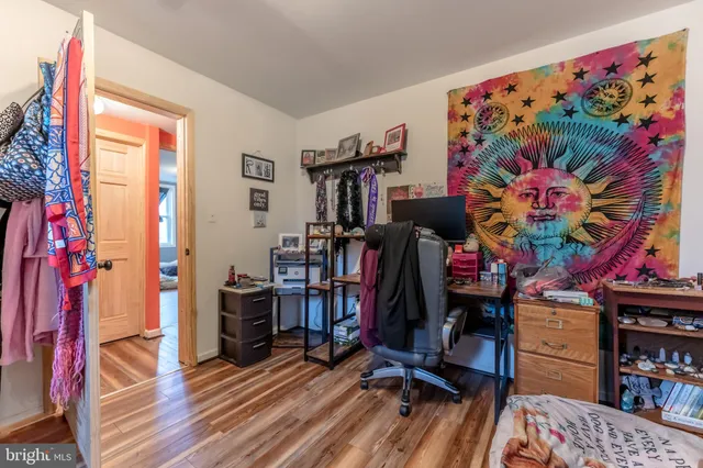 a view of a workspace with furniture and toys