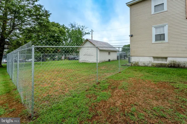 a view of a backyard with a garden