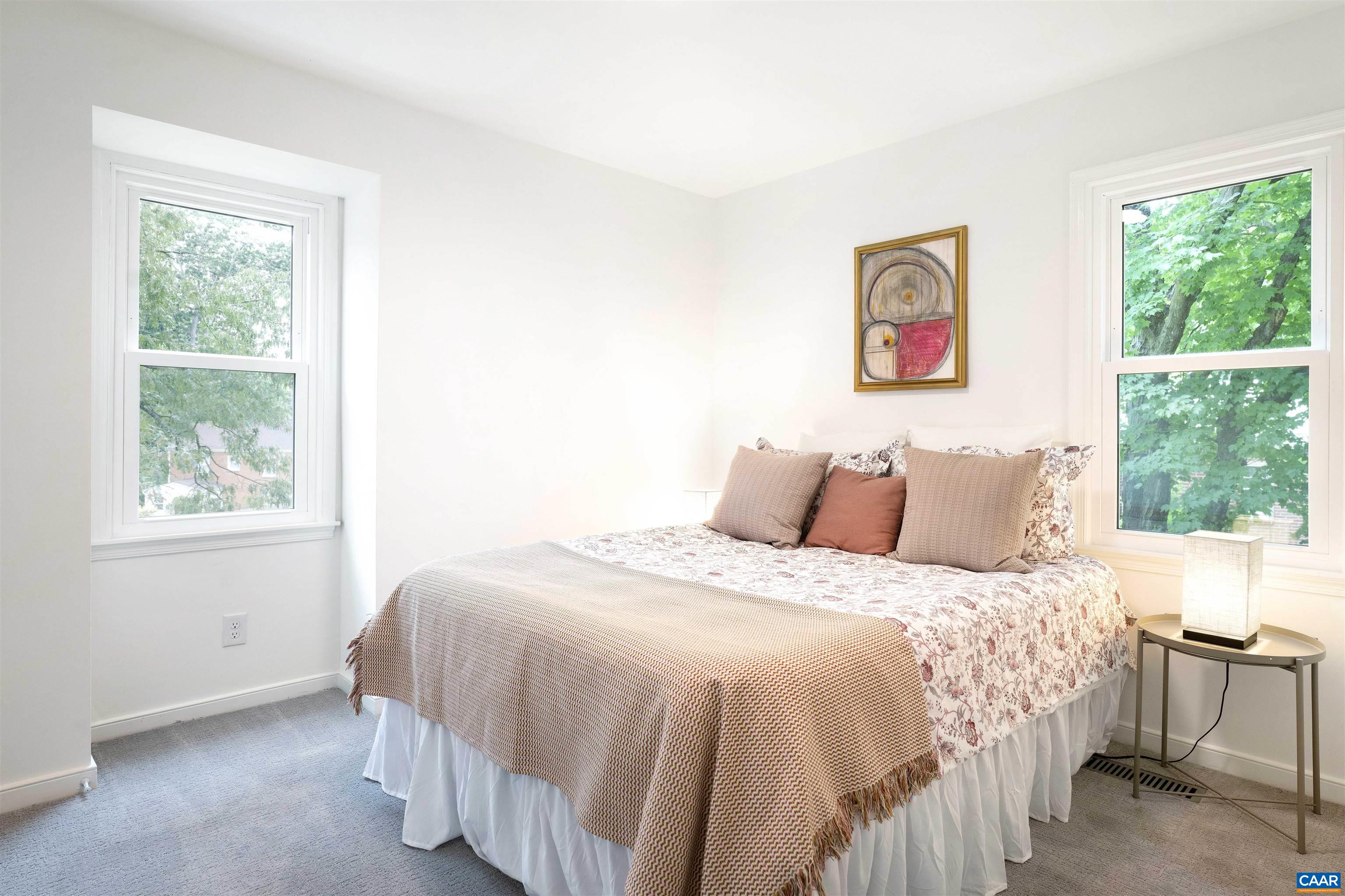 1410 Westwood Road Charlottesville, VA 22903 - Photo 17 of 20 a bedroom with a bed and a window