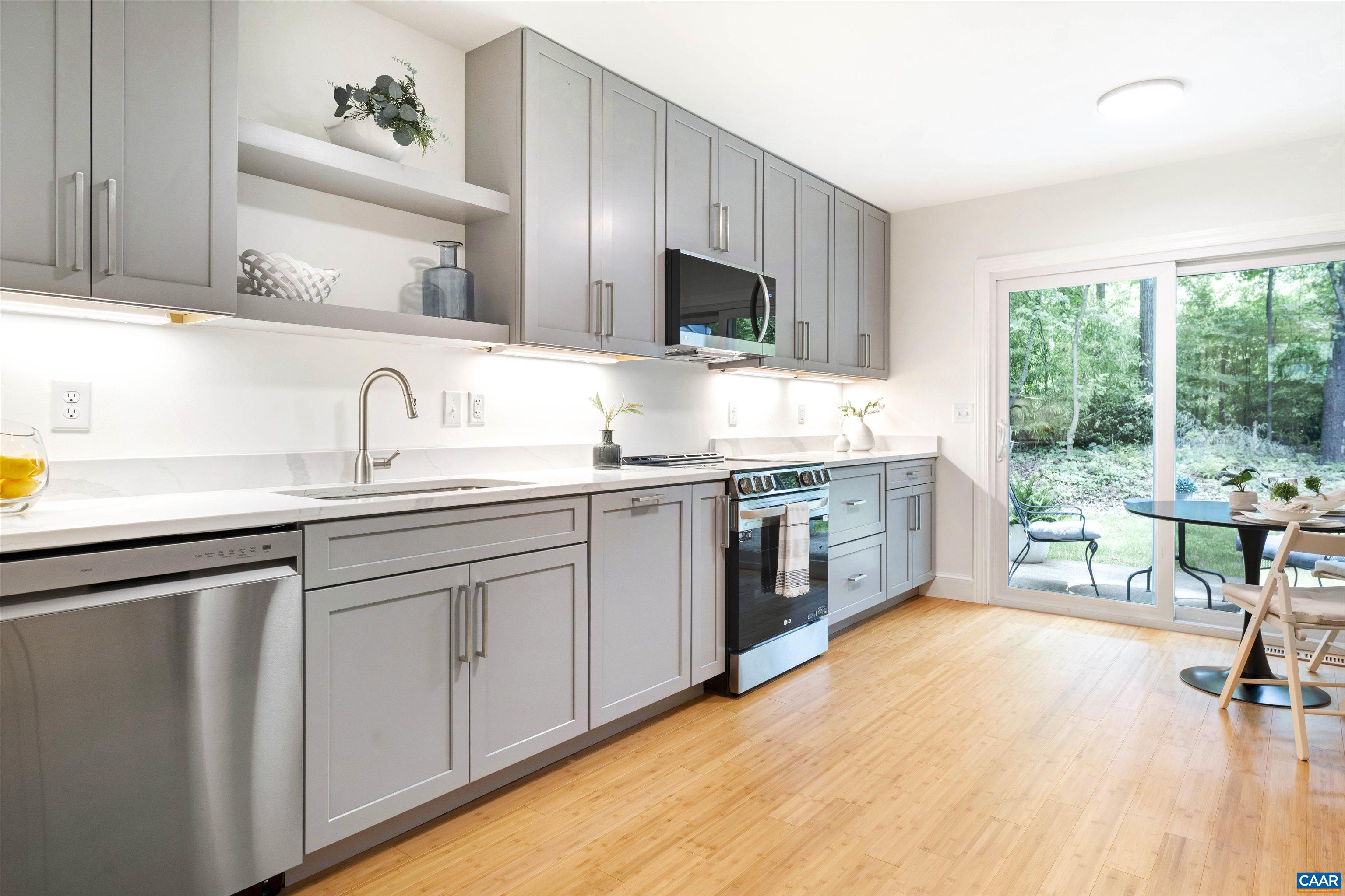 1410 Westwood Road Charlottesville, VA 22903 - Photo 6 of 20 a kitchen with a sink cabinets and window