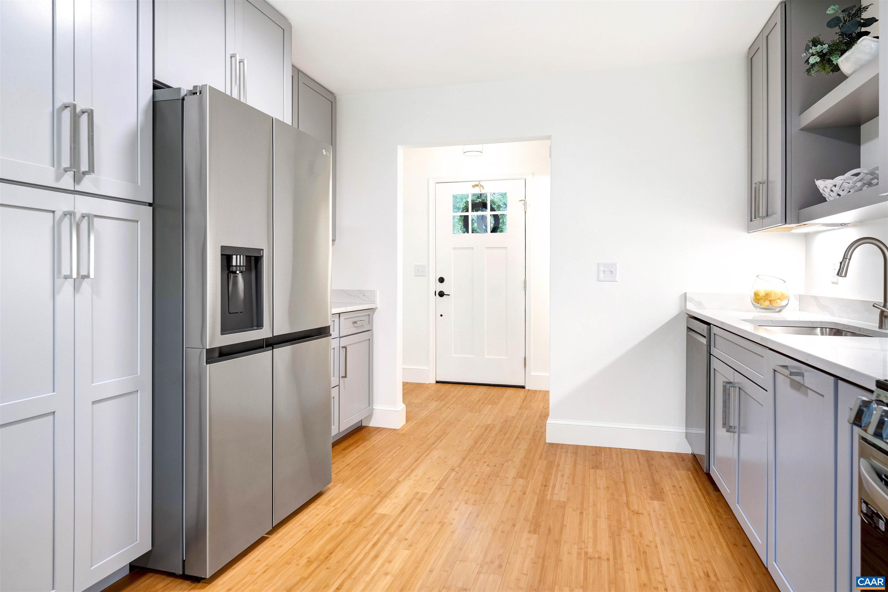 1410 Westwood Road Charlottesville, VA 22903 - Photo 7 of 20 a kitchen with stainless steel appliances a refrigerator and a sink