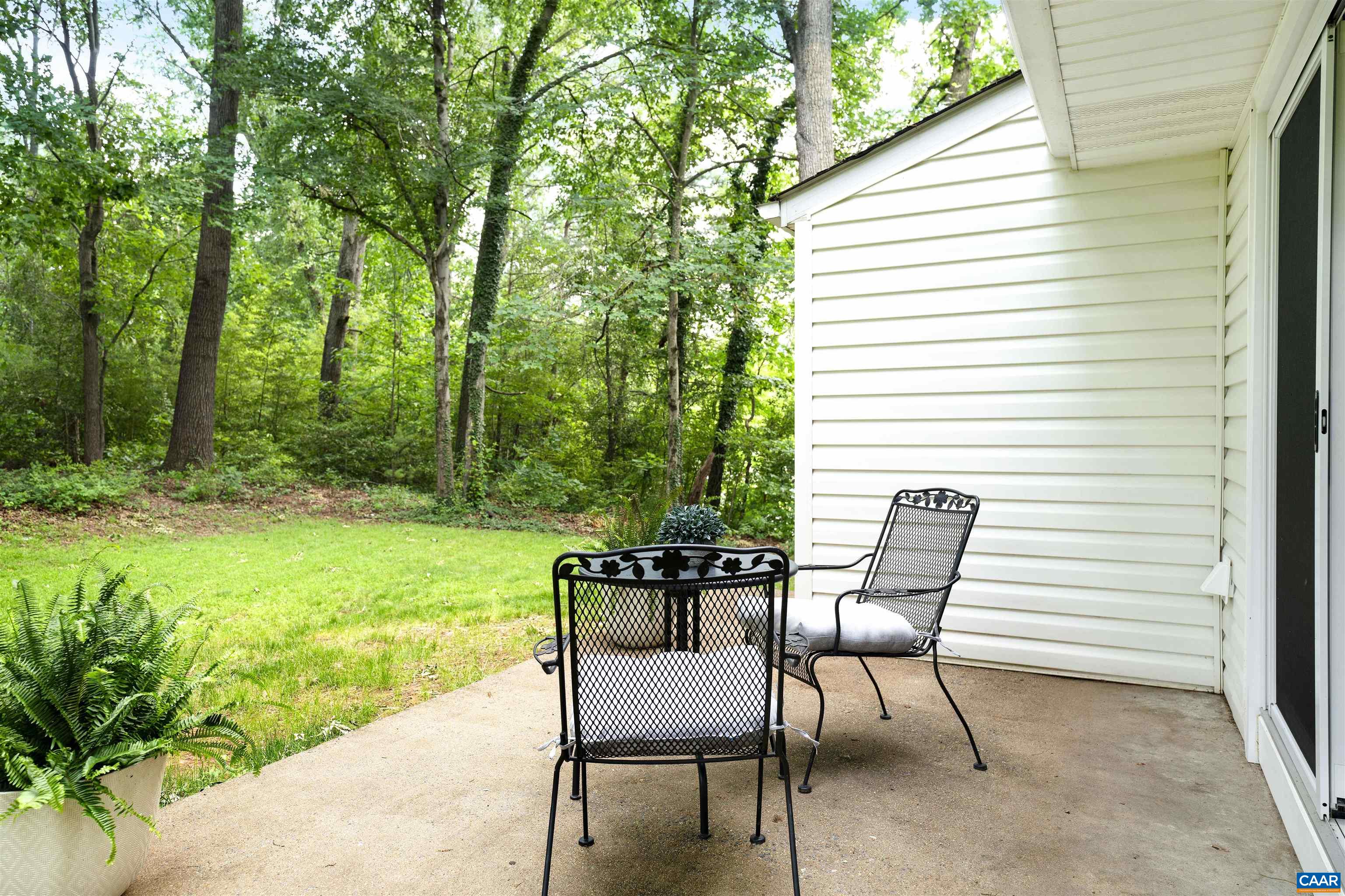 1410 Westwood Road Charlottesville, VA 22903 - Photo 9 of 20 a view of a chair and table in backyard of the house