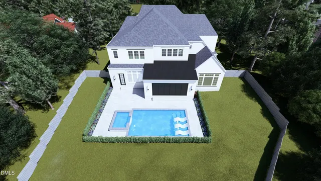 a view of a house with pool and a yard