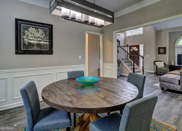 a view of a dining room with furniture