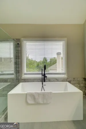a bathroom with a bathtub