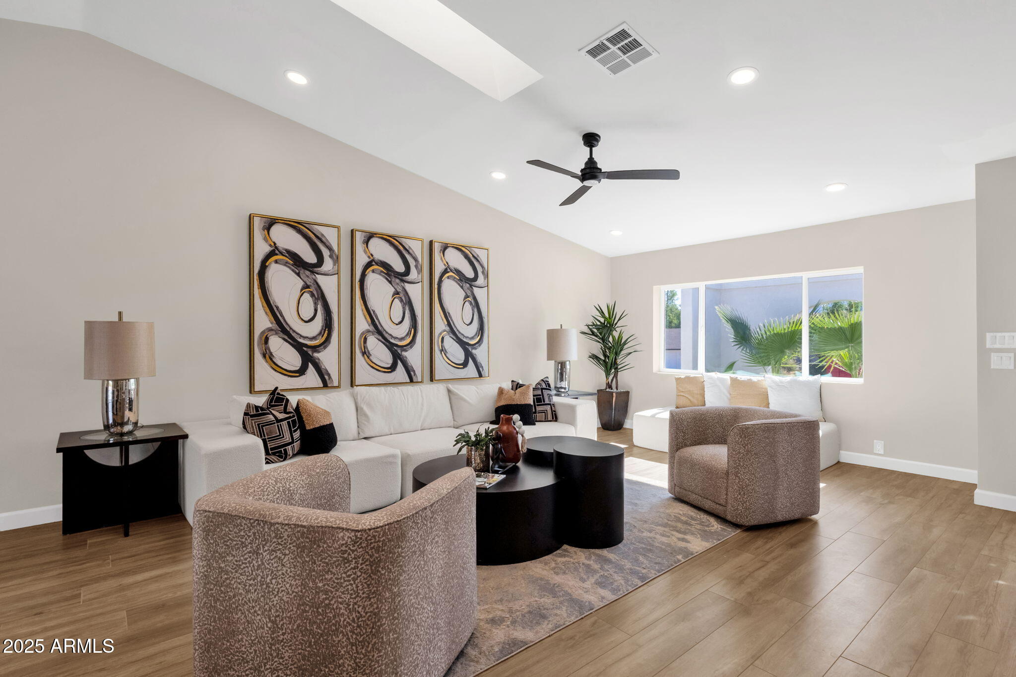 2276 East Mercer Lane Phoenix, AZ 85028 - Photo 12 of 61 a living room with furniture and a large window