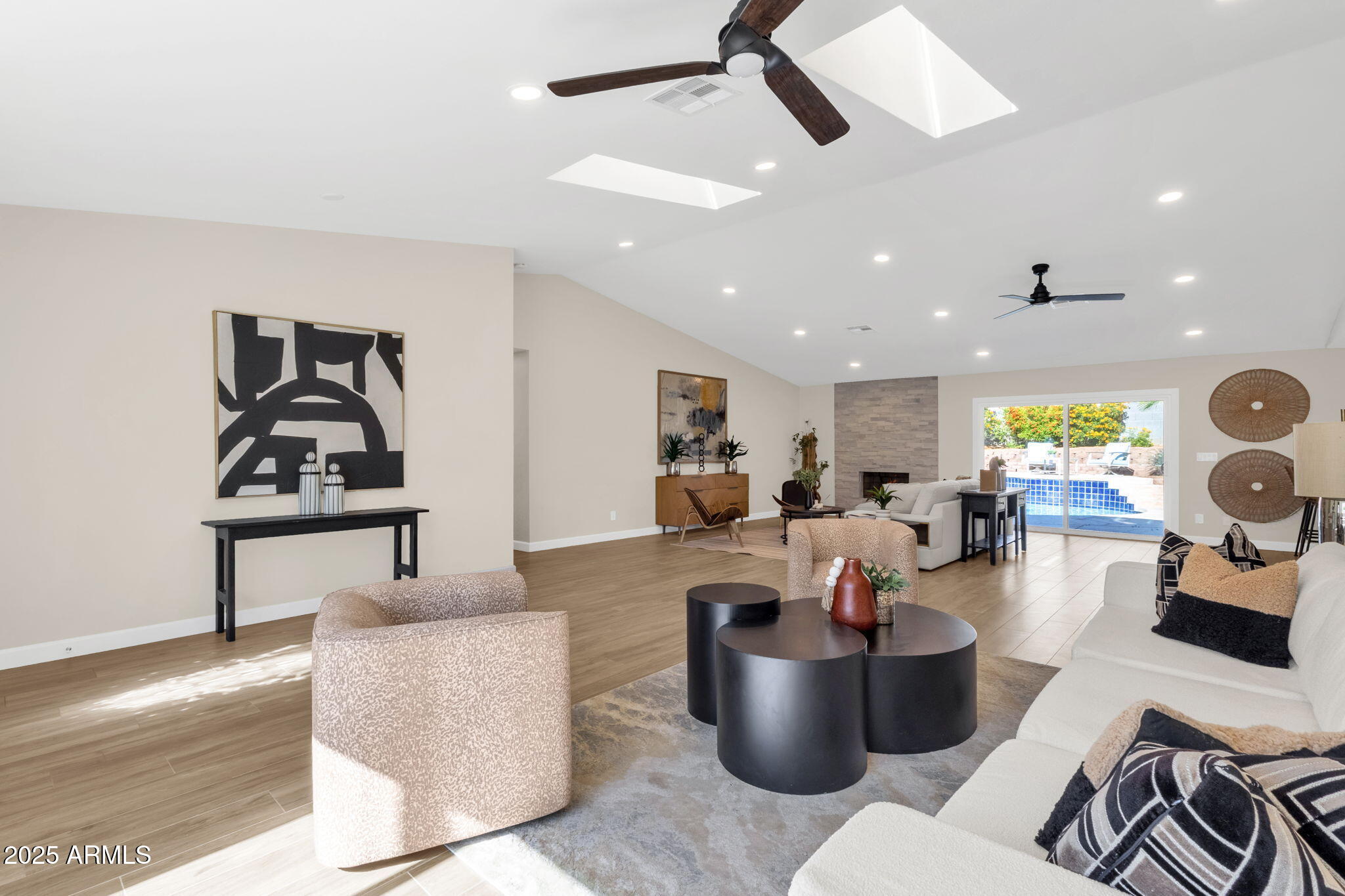 2276 East Mercer Lane Phoenix, AZ 85028 - Photo 15 of 61 a living room with furniture and a wooden floor
